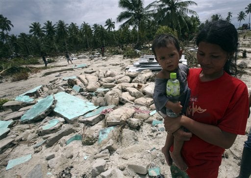 indonesia tsunami bodies. Tsunami survivors make their