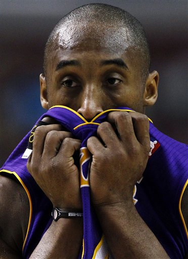 17, 2010 file photo, Los Angeles Lakers' Kobe Bryant wears a Power Balance 