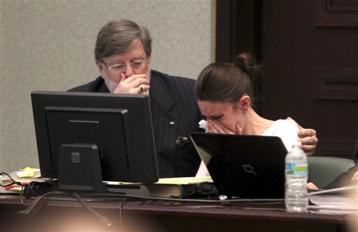 images of casey anthony partying. comforts Casey Anthony as