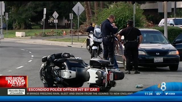 Escondido Police Officer Knocked Off Motorcycle By Car Cbs News 8 San Diego Ca News Station 8779